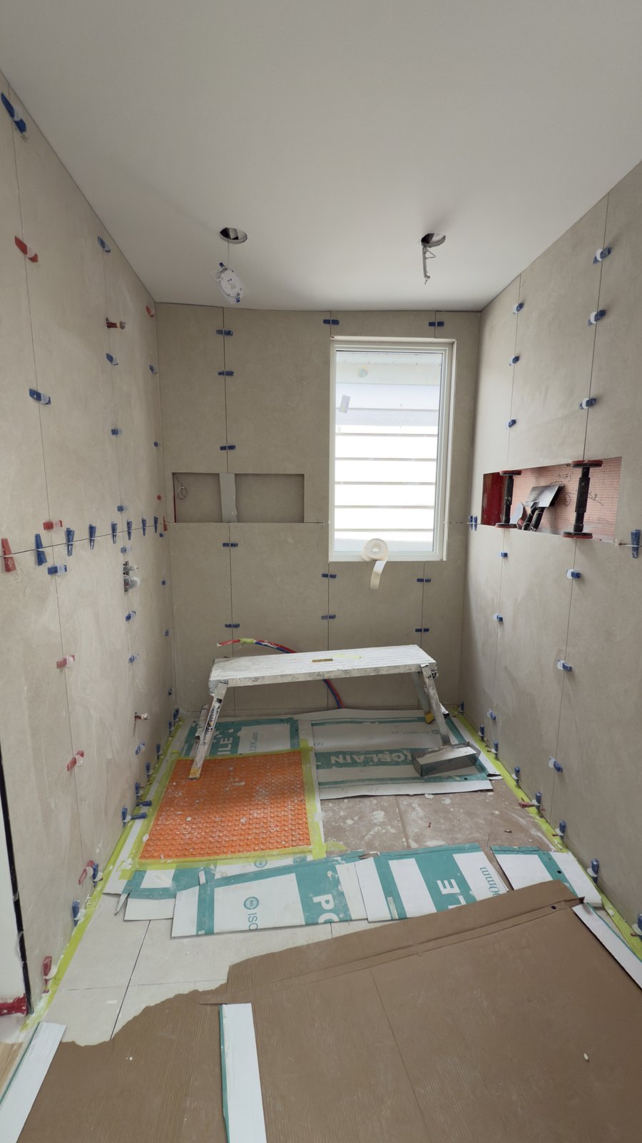 Bathroom Tile Preparation by Barewalls Construction