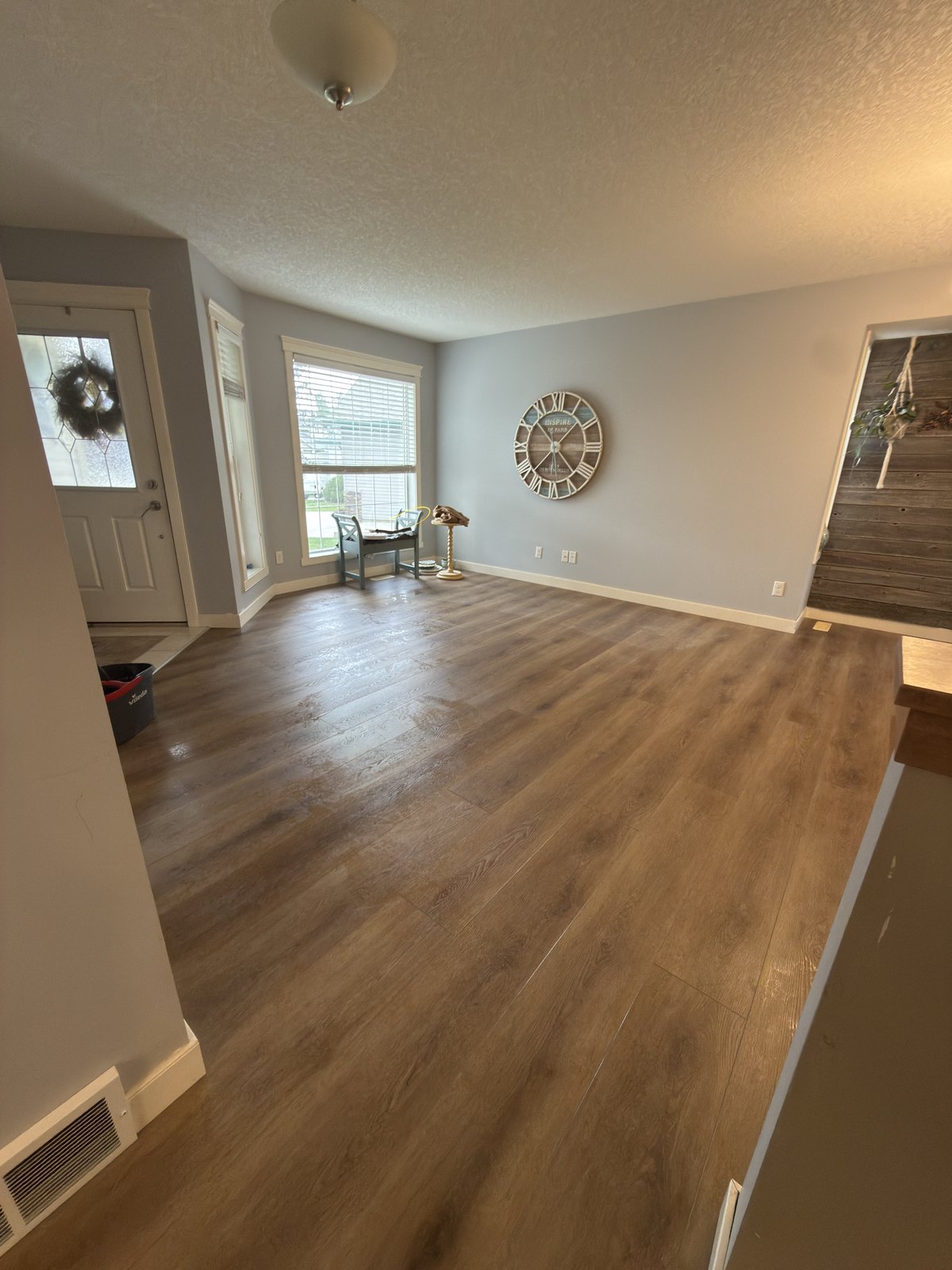 Finished Open Living Space by Barewalls Construction