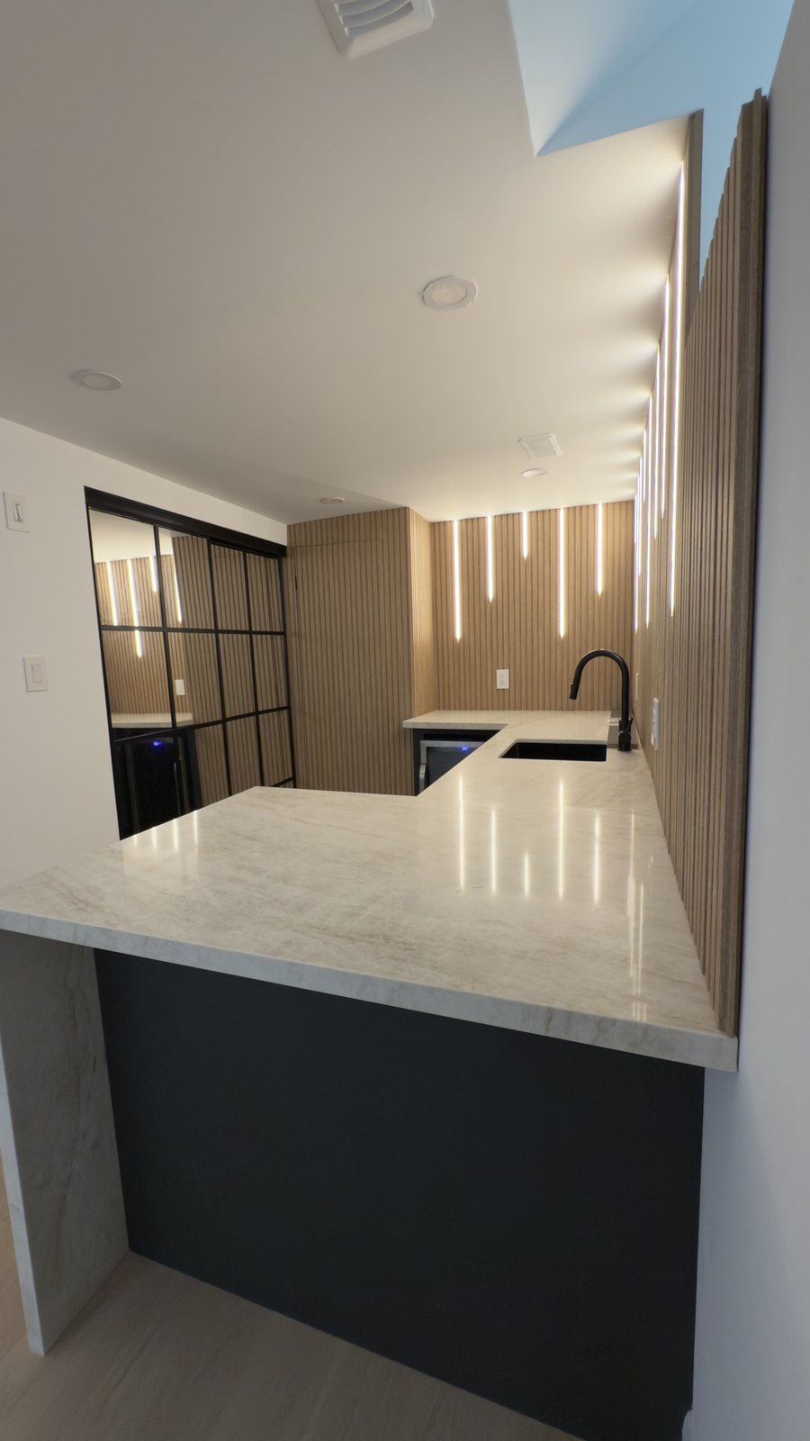 Kitchen Island & Stone Counter by Barewalls Construction