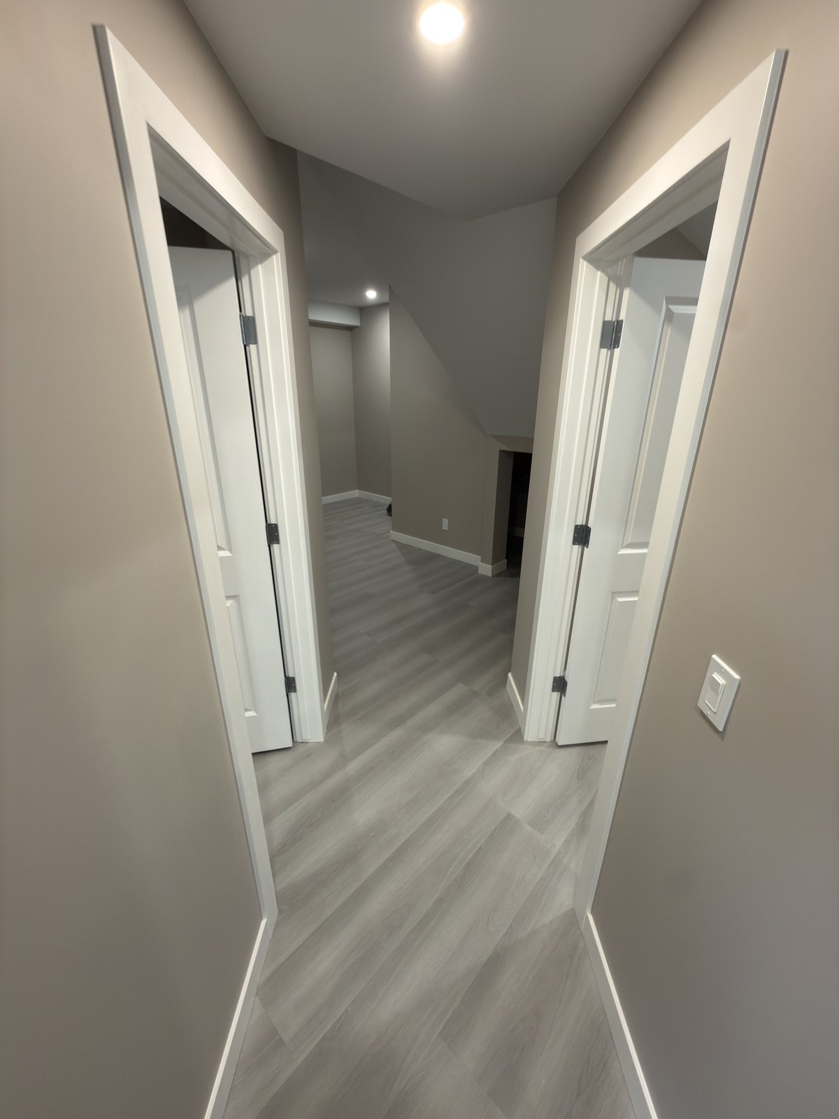 Finished Basement Hallway by Barewalls Construction