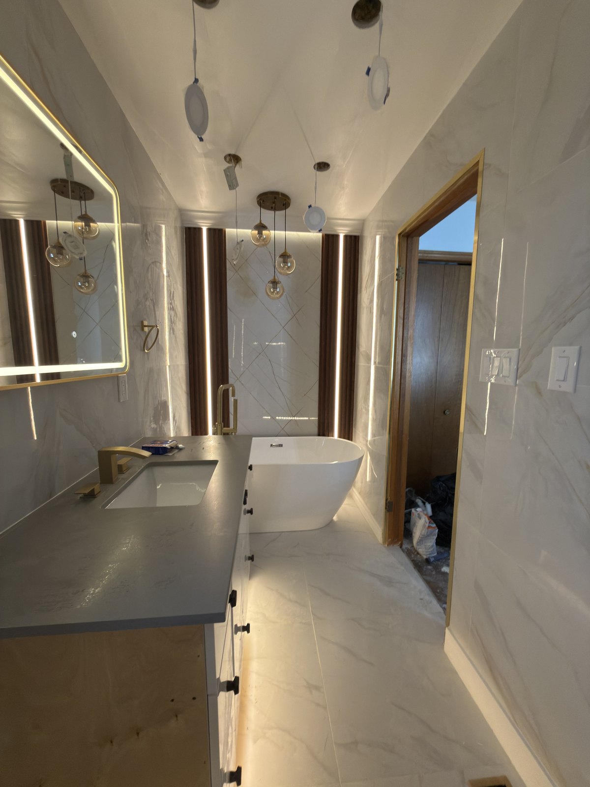 Marble-Finish Bathroom by Barewalls Construction