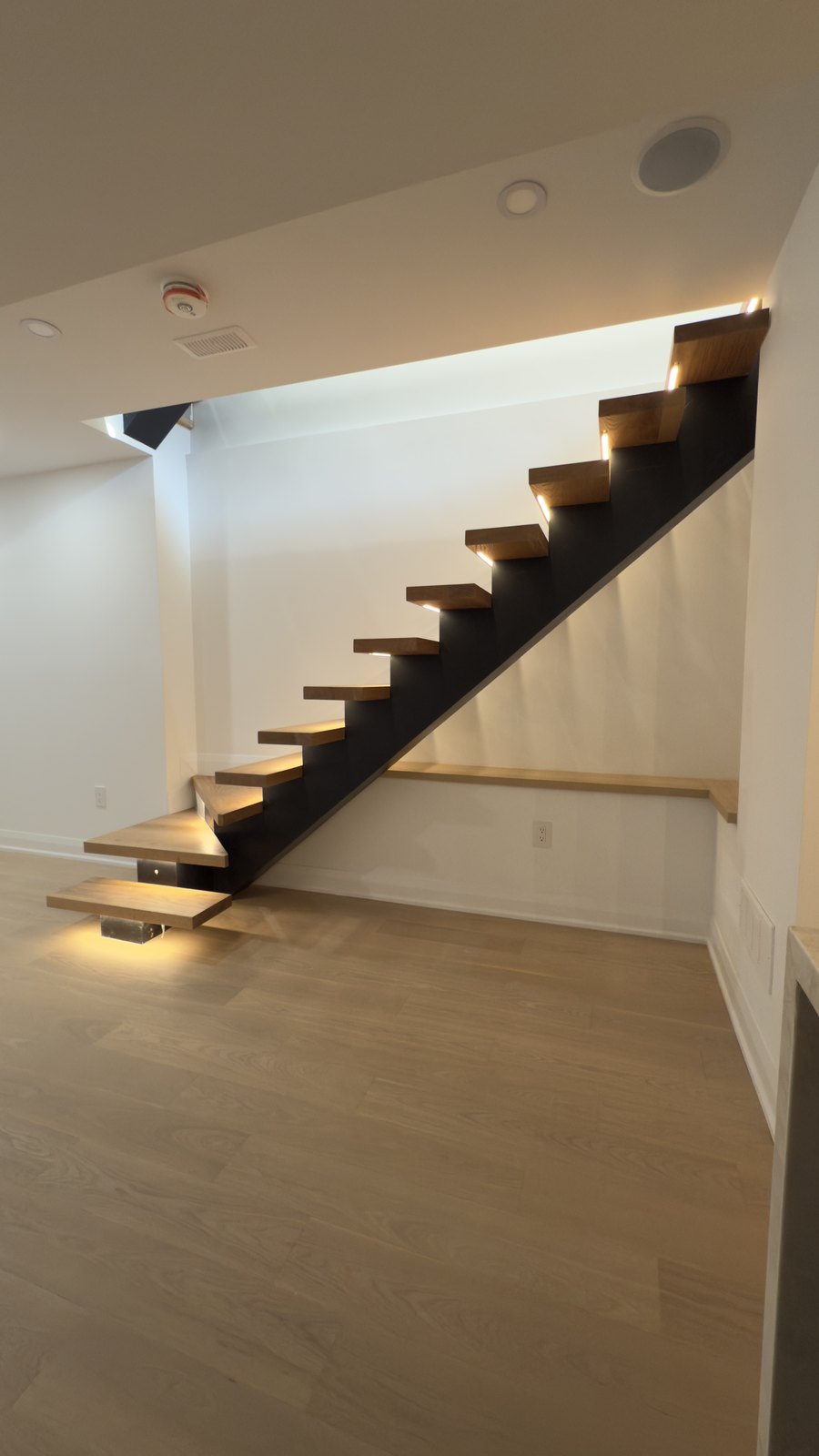 Floating Staircase Finish by Barewalls Construction